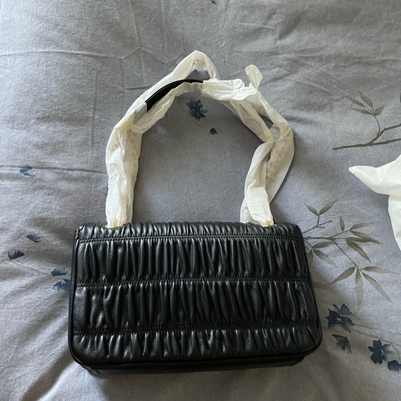 100% Authentic Prada crossbody bag. Purchased at Prada outlet. Nappa Gaufre - Picture 4 of 11
